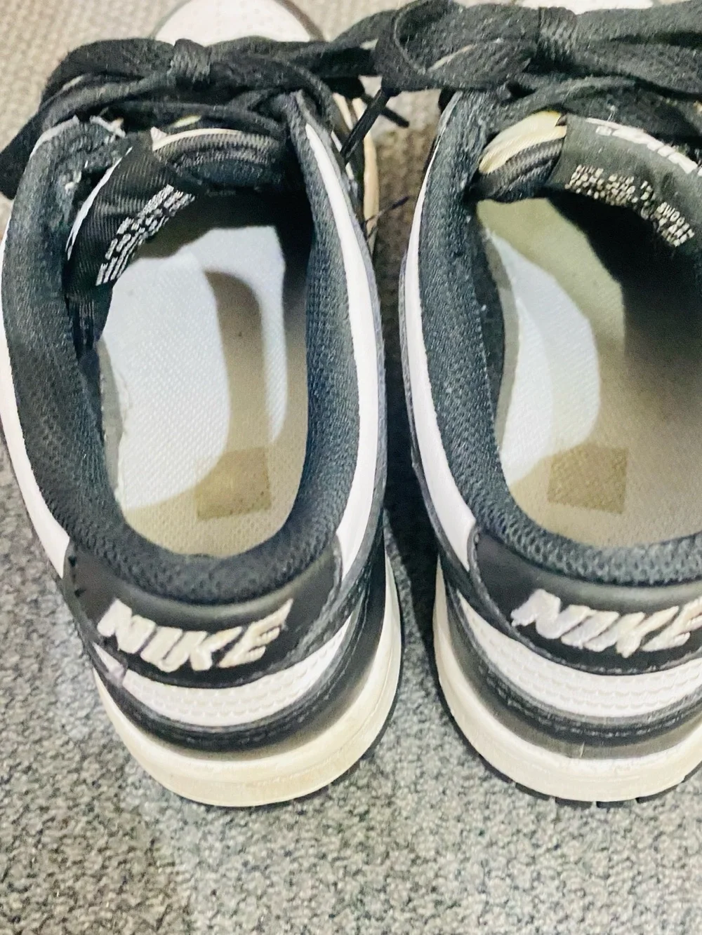 Nike Women’s Black and White Low-Top Sneakers with Swoosh